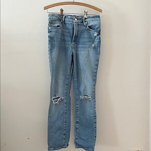 Women’s Good American jeans ripped knee straight blue jeans